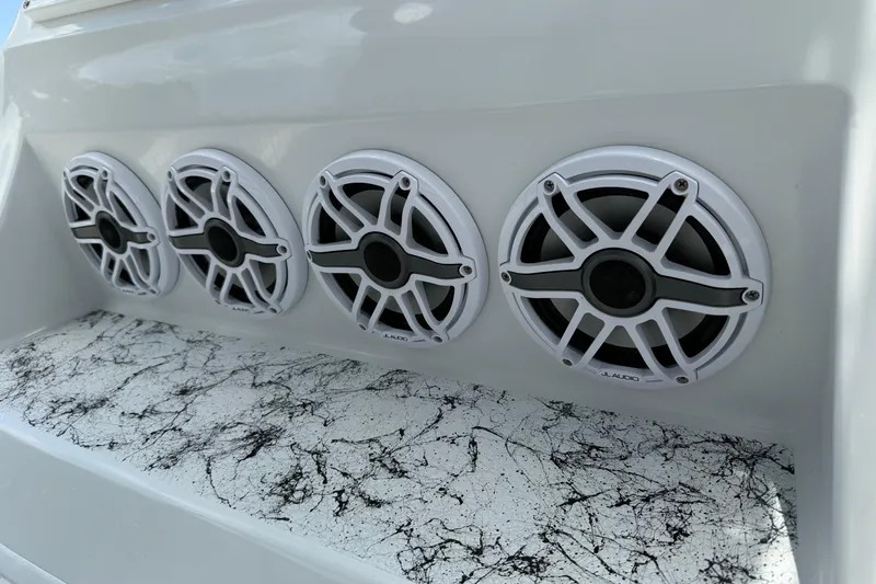 Slide: The Image of Four JL Audio speakers on a 2024 Shallow Sport 25 X3 boat. - 18