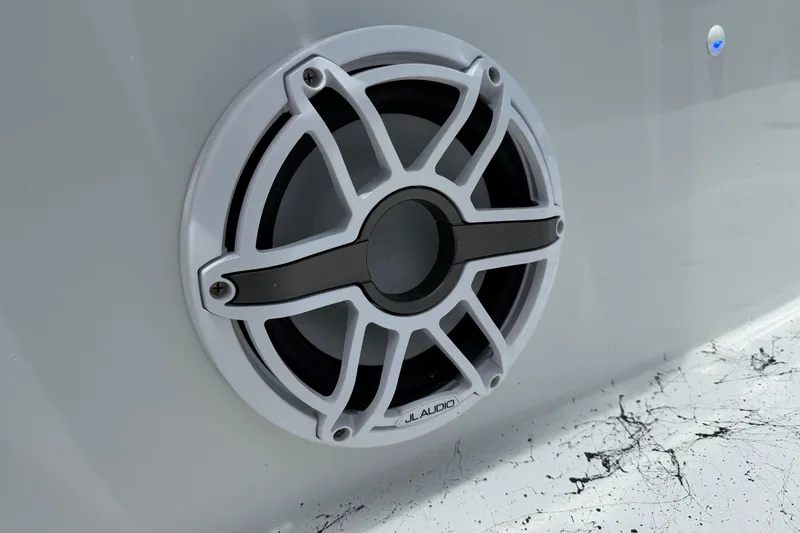 Slide: The Image of Close-up of JL Audio speaker on 2024 Shallow Sport 25 X3 boat. - 19