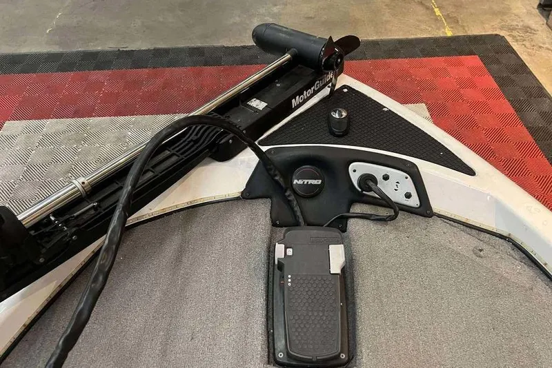 Slide: The Image of 2005 Nitro NX 750 boat with MotorGuide trolling motor and foot pedal control. - 4