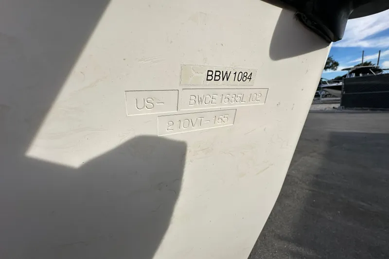 Slide: The Image of Hull identification number on a 2002 Boston Whaler 210 Ventura boat. - 95
