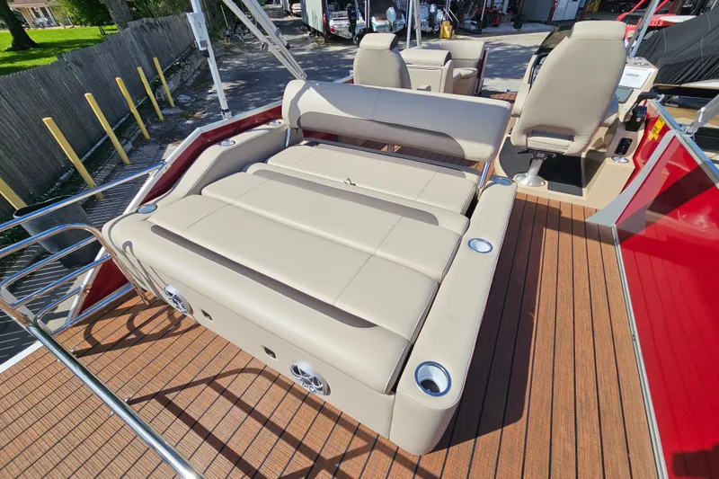 Slide: The Image of 2025 Bentley Pontoons Legacy 243 Swingback with luxurious seating and sleek design. - 25