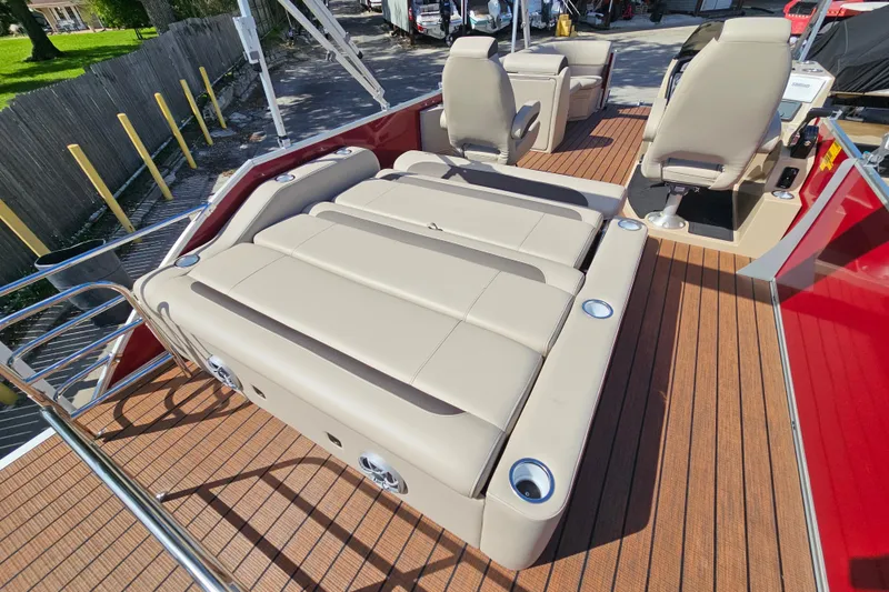 Slide: The Image of 2025 Bentley Pontoons Legacy 243 Swingback with luxurious seating and sleek design. - 27