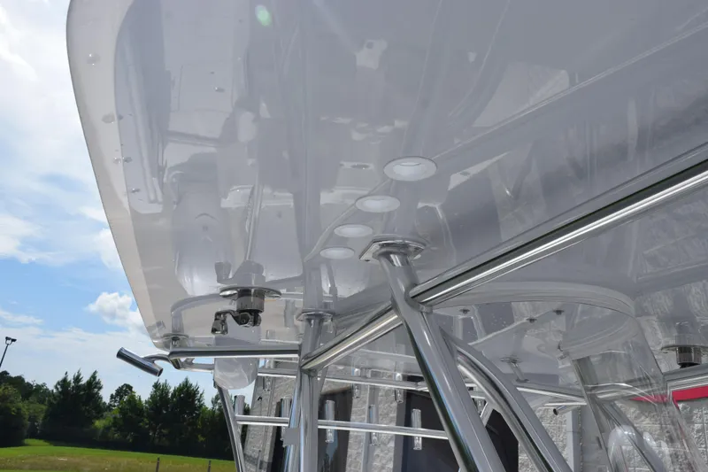 Slide: The Image of 2025 Contender 35 ST boat with sleek metal framework and modern design elements. - 34