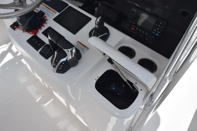 Slide: The Image of Control panel of 2025 Contender 35 ST boat with modern navigation equipment. - 37