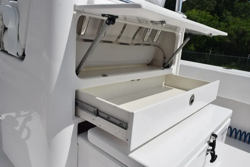 Slide: The Image of Open storage compartment on 2025 Contender 35 ST boat, showcasing sleek design and functionality. - 39