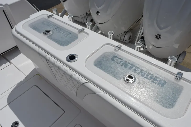 Slide: The Image of 2025 Contender 35 ST boat deck with livewell and outboard engines. - 41