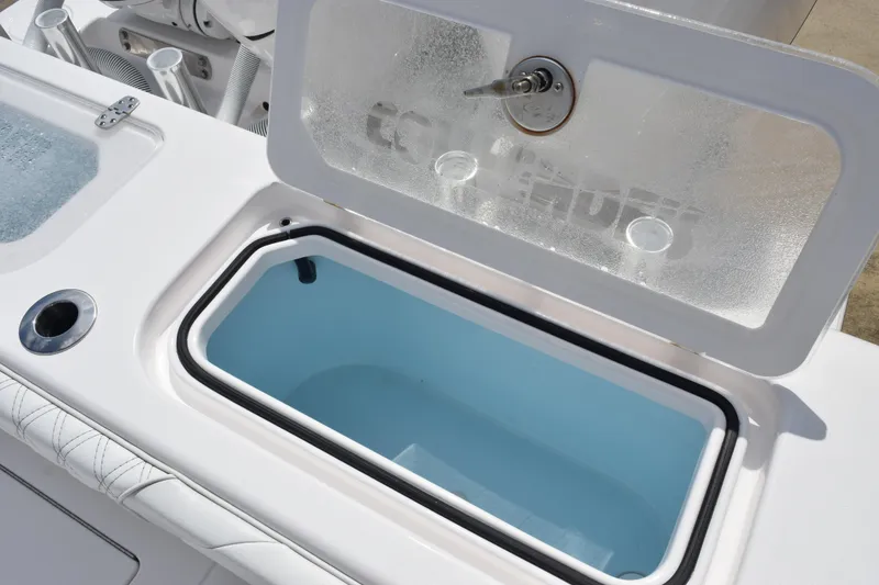 Slide: The Image of 2025 Contender 35 ST boat livewell with open lid, showcasing interior design. - 42