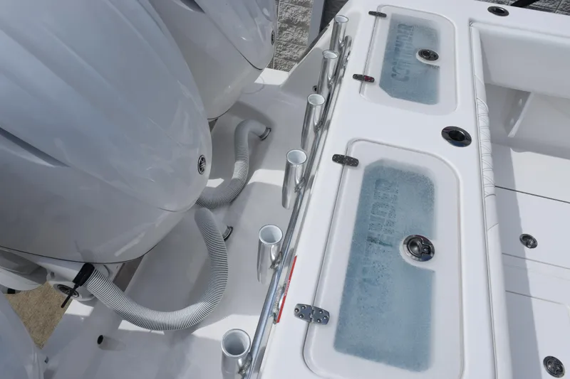 Slide: The Image of 2025 Contender 35 ST boat with dual engines and live wells. - 46