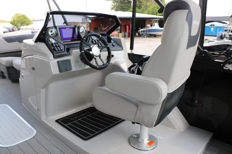 Slide: The Image of 2025 Sylvan L3 CLZ DH boat cockpit with steering wheel and modern controls. - 17