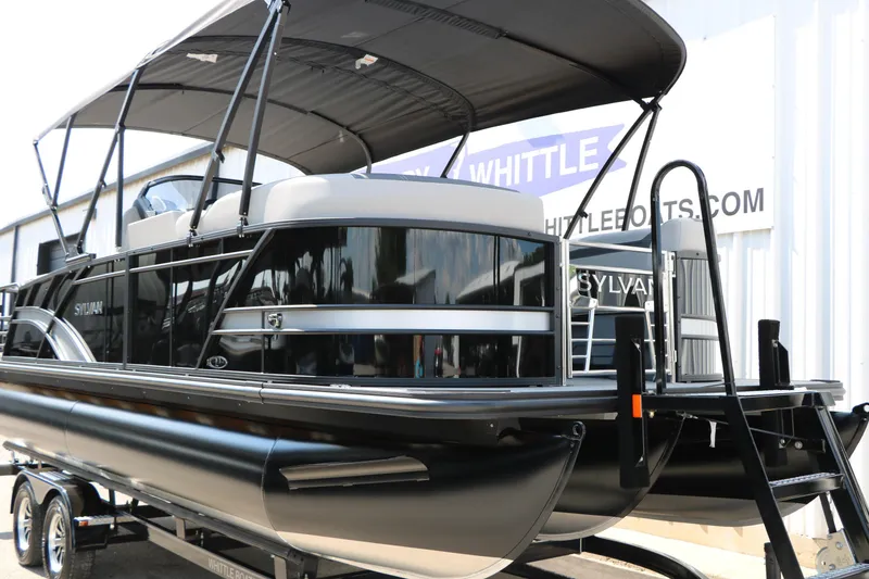 Slide: The Image of 2025 Sylvan L3 CLZ DH pontoon boat with canopy on trailer. - 4