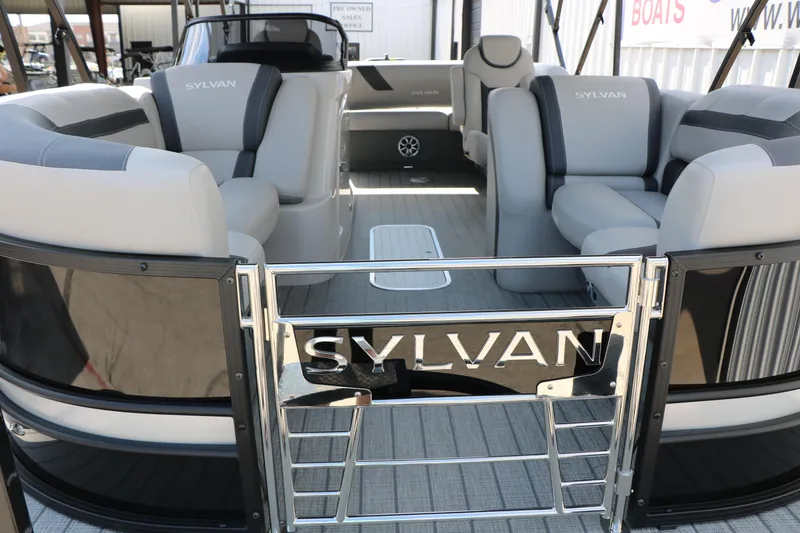 Slide: The Image of 2025 Sylvan L3 CLZ DH pontoon boat with luxurious seating and sleek design. - 9