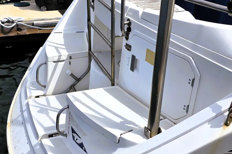 Slide: The Image of Hunter 43 Legend 1992 yacht stern with ladder and storage compartment. - 30