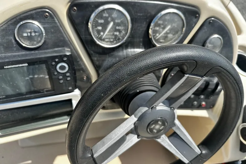 Slide: The Image of Steering wheel and dashboard of 2016 Godfrey Sweetwater 2086 Pontoon boat. - 5