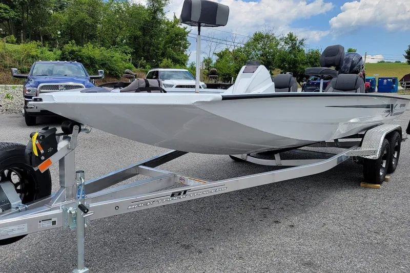 Slide: The Image of 2026 Xpress H20 Bass boat interior with seating and storage compartments. - 15