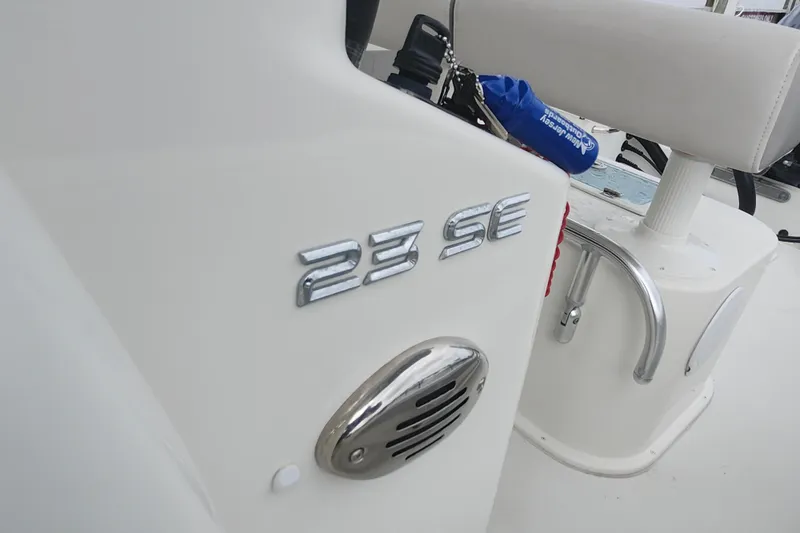 Slide: The Image of 2020 Parker 2300 Special Edition boat interior with "23 SE" emblem. - 18