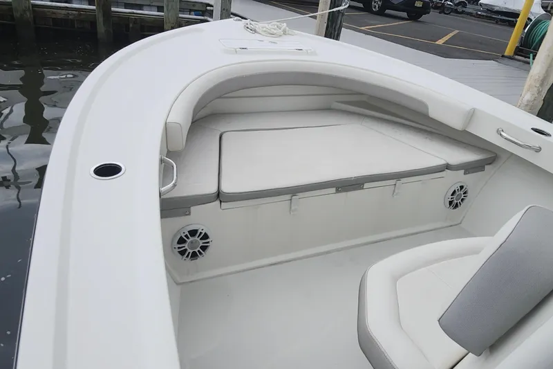 Slide: The Image of 2020 Parker 2300 Special Edition boat interior with cushioned seating and speakers. - 20