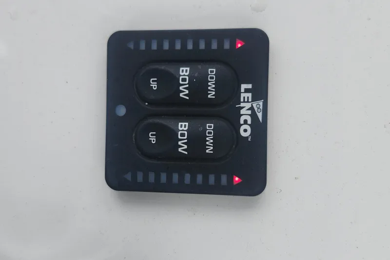 Slide: The Image of Lenco trim tab control panel on Parker 2300 Special Edition boat, 2020 model. - 23