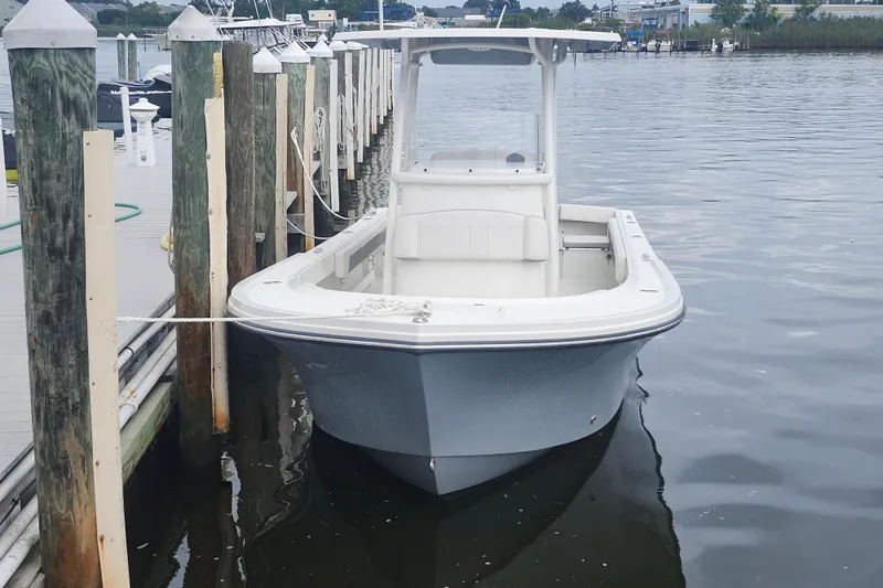 Slide: The Image of 2020 Parker 2300 Special Edition boat docked at marina. - 7
