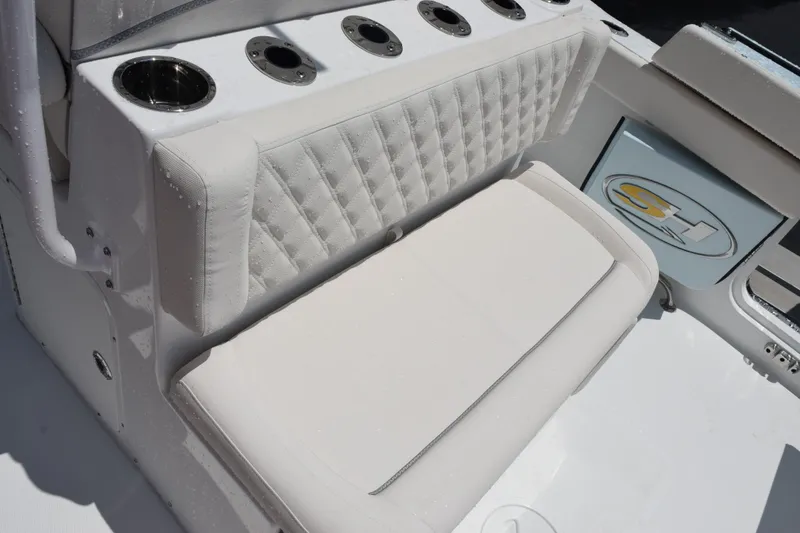 Slide: The Image of Luxurious seating on 2026 Sea Hunt Ultra 275 SE boat with cup holders. - 10