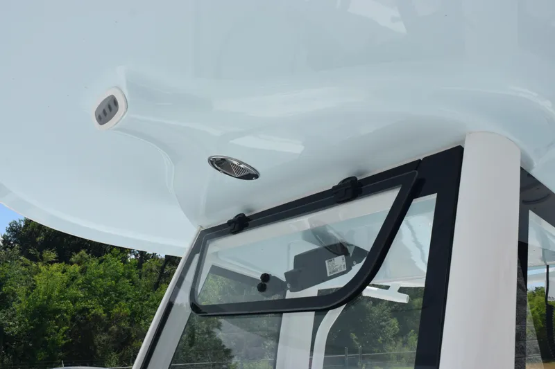 Slide: The Image of 2026 Sea Hunt Ultra 275 SE boat roof and window detail. - 21