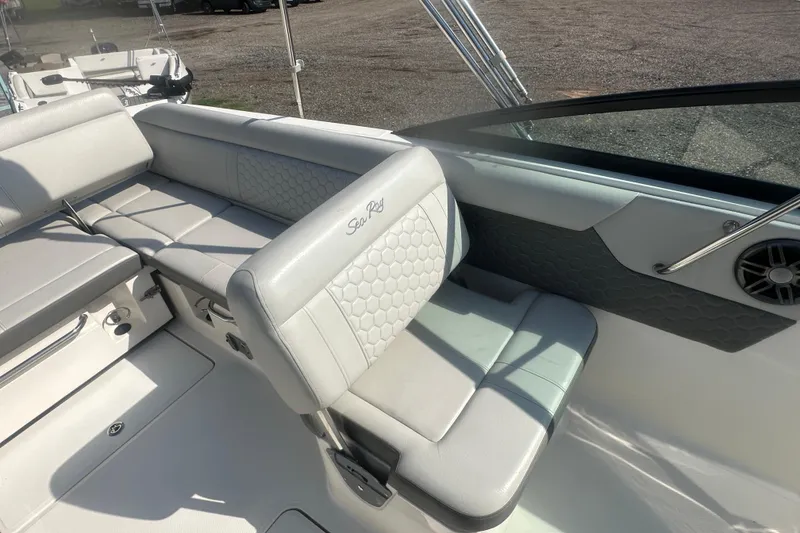 Slide: The Image of 2023 Sea Ray SDX 250 Outboard interior with luxurious seating and modern design. - 17