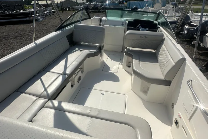 Slide: The Image of 2023 Sea Ray SDX 250 Outboard boat interior with spacious seating and modern design. - 27