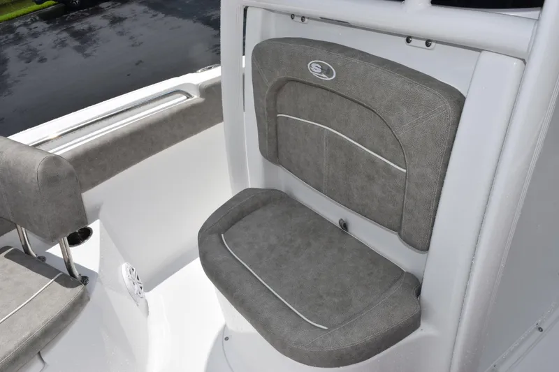 Slide: The Image of 2026 Sea Hunt Ultra 219 boat seat with gray upholstery and sleek design. - 14