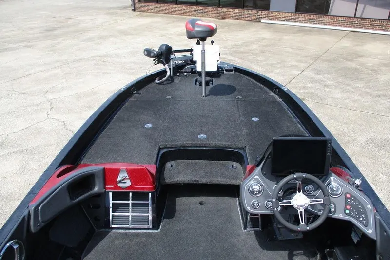Slide: The Image of 2010 Ranger Z520 boat interior with steering wheel and control panel. - 6