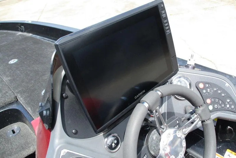 Slide: The Image of 2010 Ranger Z520 boat dashboard with Garmin display and steering wheel. - 8