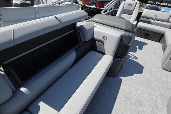 Slide: The Image of 2026 Sun Tracker PB 20 DLX pontoon boat with spacious seating and modern design. - 4