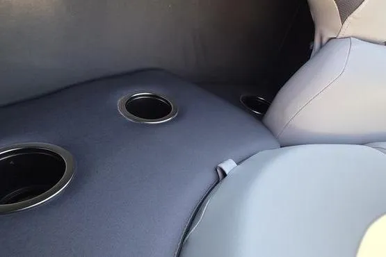 Slide: The Image of Interior of 2026 Sun Tracker PB 20 DLX with cup holders and seating. - 9