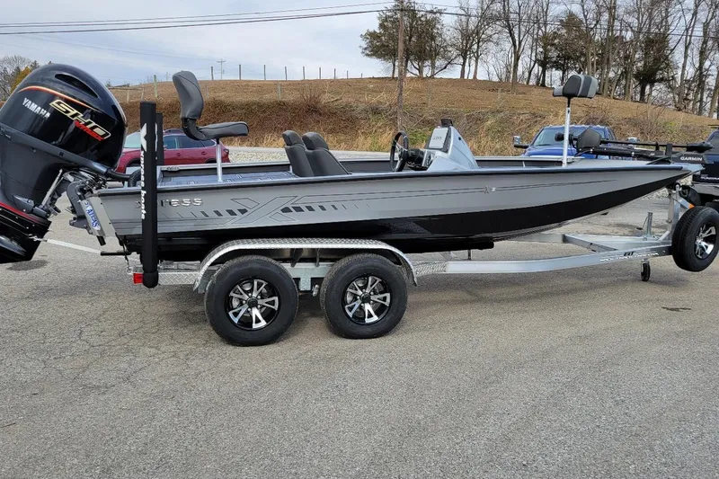Slide: The Image of 2026 Xpress X19 Pro Bass boat with Yamaha Vmax 200 SHO engine on trailer. - 1