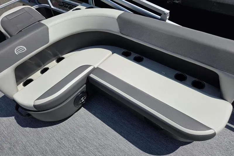 Slide: The Image of Luxurious seating on 2026 Sun Tracker BB 18 DLX pontoon boat with cup holders. - 9