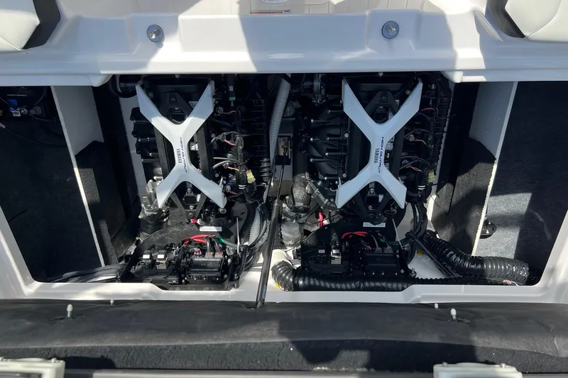 Slide: The Image of 2024 Yamaha Boats 222SE engine compartment with dual engines and wiring. - 11