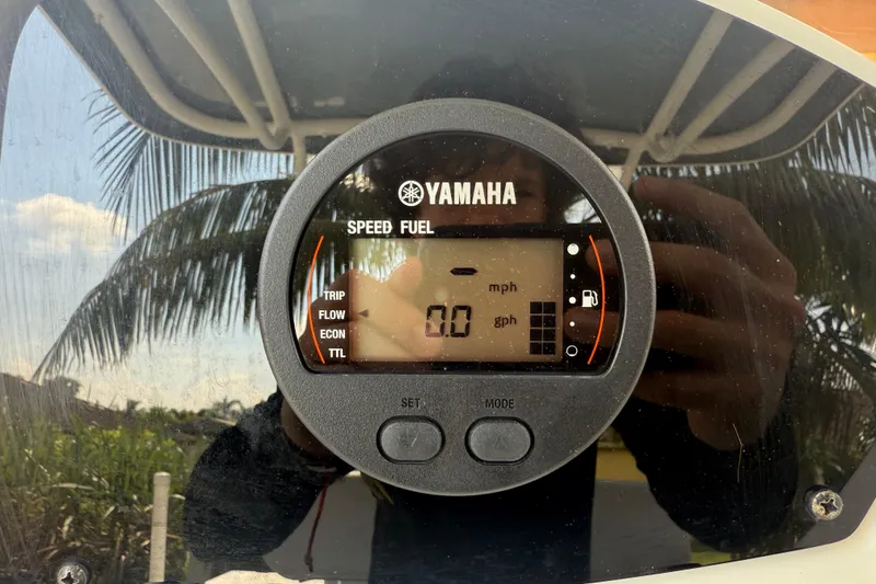 Slide: The Image of Yamaha speed fuel gauge on 2020 Striper 220 Center Console boat dashboard. - 37