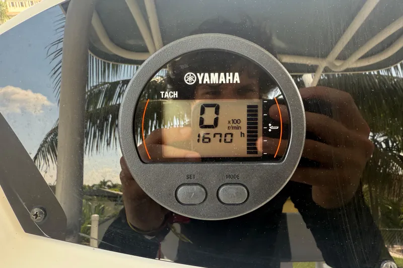 Slide: The Image of Yamaha tachometer on 2020 Striper 220 Center Console, displaying 1670 hours. - 38