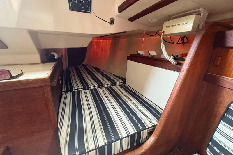 Slide: The Image of Wooden framed hatch with mesh screen on a 1981 Sabre 31 boat. - 20