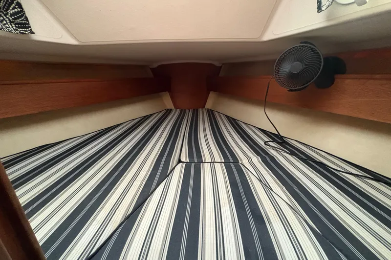 Slide: The Image of Interior view of a 1981 Sabre 31 sailboat cabin entrance with ropes and winches. - 21