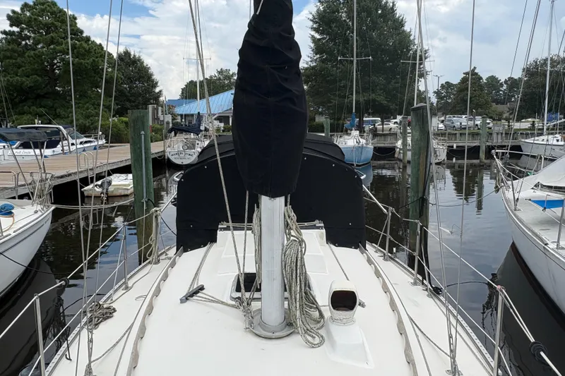 Slide: The Image of Interior of 1981 Sabre 31 sailboat with colorful ropes and fabric storage. - 62