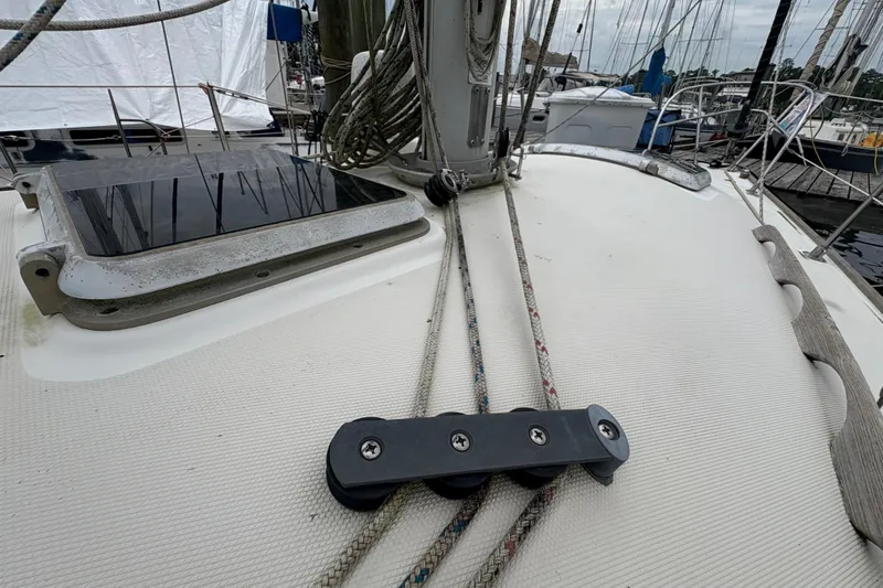 Slide: The Image of Interior of 1981 Sabre 31 sailboat with wooden cabinetry and storage space. - 64