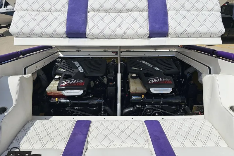 Slide: The Image of 2003 Sonic USA 31SS boat engine compartment with twin MerCruiser 496 MAG HO engines. - 97