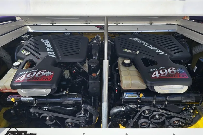 Slide: The Image of Twin MerCruiser 496 MAG HO engines in a 2003 Sonic USA 31SS boat. - 98