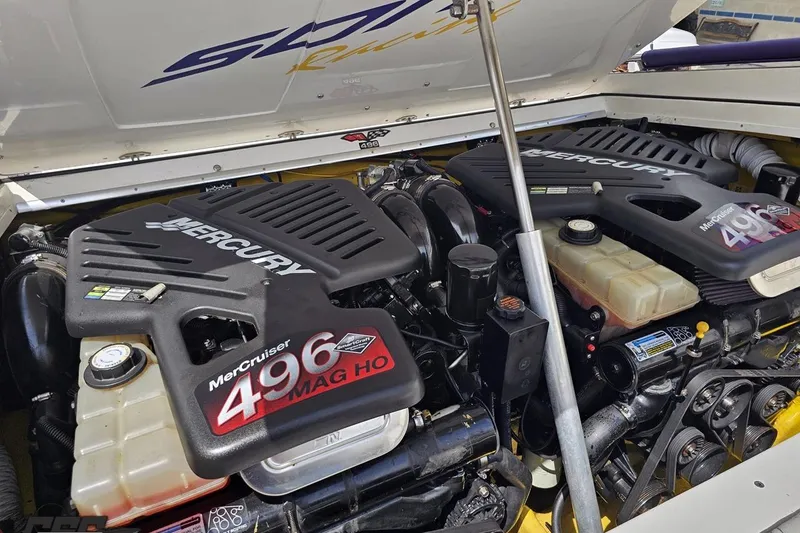 Slide: The Image of Twin MerCruiser 496 MAG HO engines in a 2003 Sonic USA 31SS boat. - 99