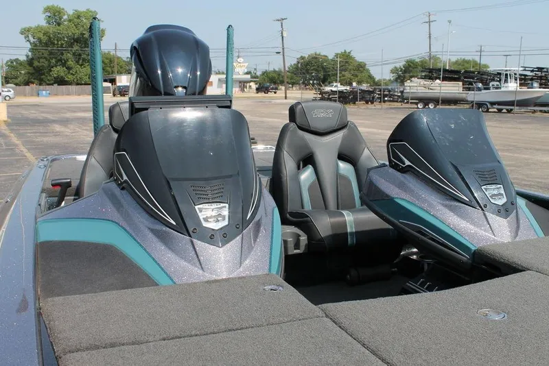 Slide: The Image of 2019 Skeeter FX21 LE boat interior with dual seats and sleek design. - 4