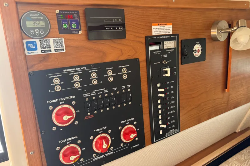 Slide: The Image of Control panel of 2026 Cutwater C-288 Coupe boat with essential circuits and gauges. - 17
