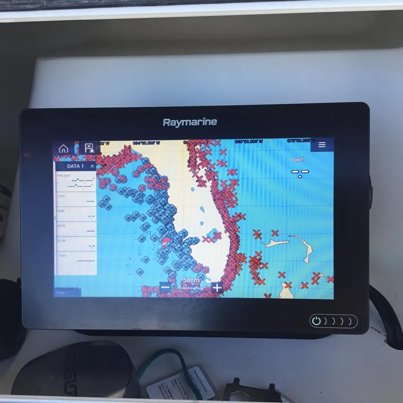 Slide: The Image of Raymarine navigation display on 2004 Century 3200 Center Console boat, showing nautical chart. - 31