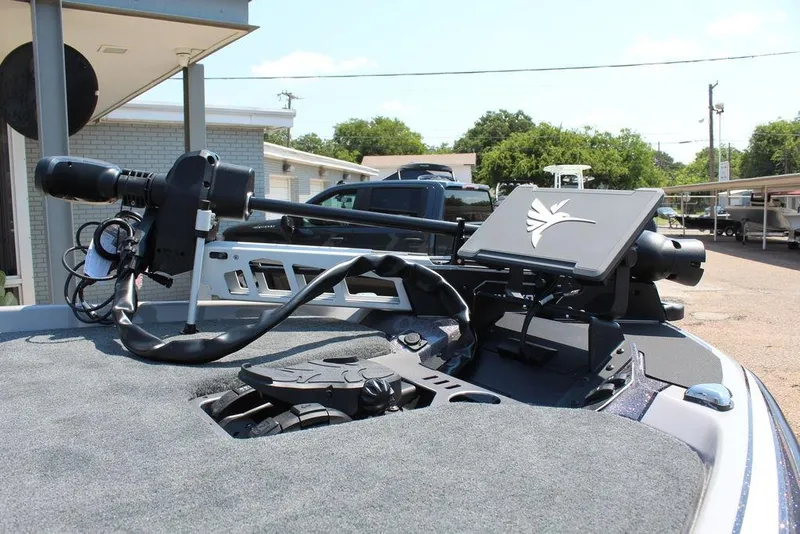 Slide: The Image of 2026 Skeeter FXR20 FLEX boat with advanced navigation equipment. - 12