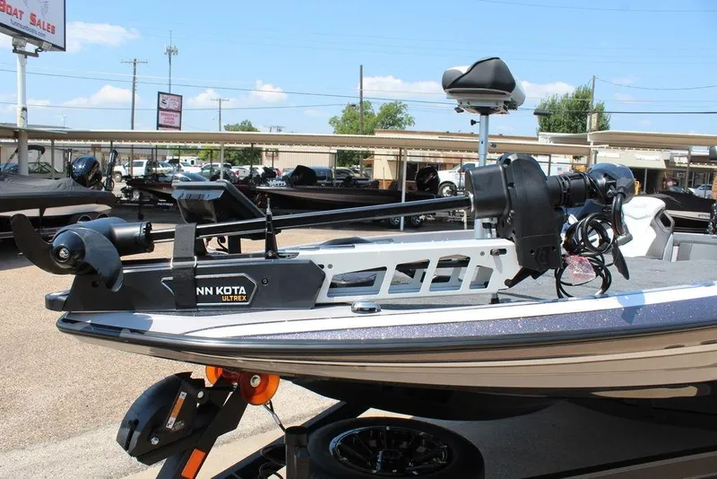 Slide: The Image of 2026 Skeeter FXR20 FLEX boat on trailer, featuring sleek design and powerful engine. - 2