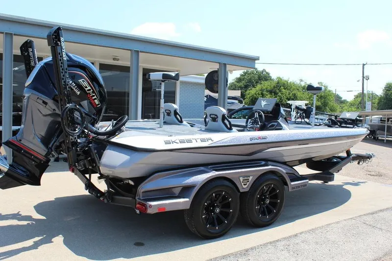 Slide: The Image of Close-up of 2026 Skeeter FXR20 FLEX boat control panel with pairing feature. - 4