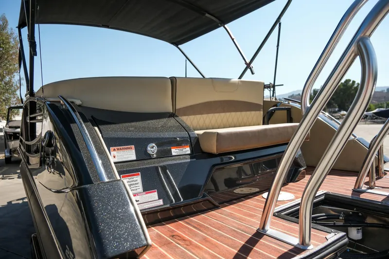 Slide: The Image of 2018 Crest Savannah 250 SLS boat with cushioned seating and stainless steel railings. - 18